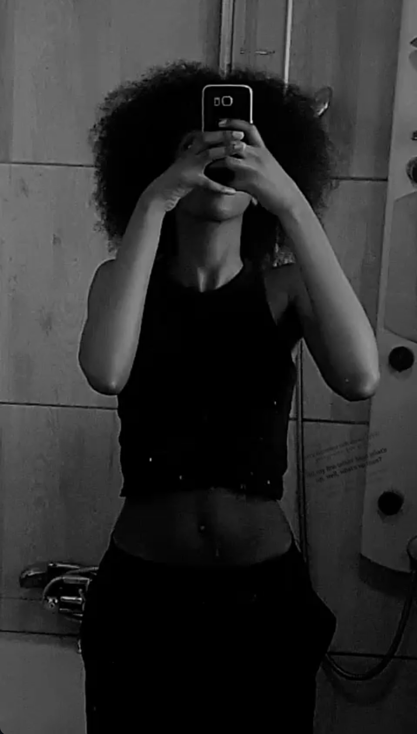 Lerato in a black-and-white mirror photograph